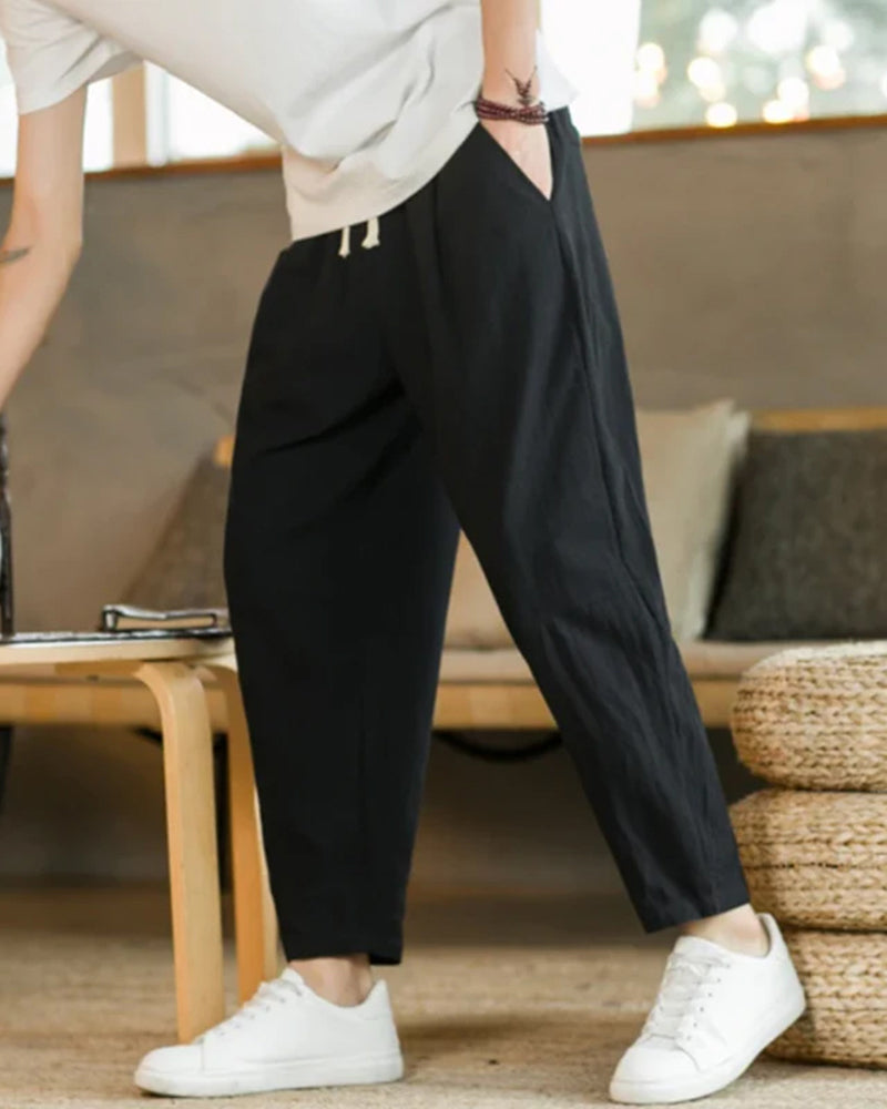 Men's Tapered Trousers with Pleats and Drawstring Waist