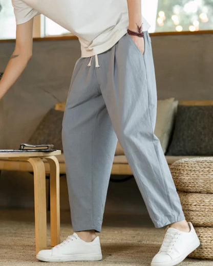 Men's Tapered Trousers with Pleats and Drawstring Waist